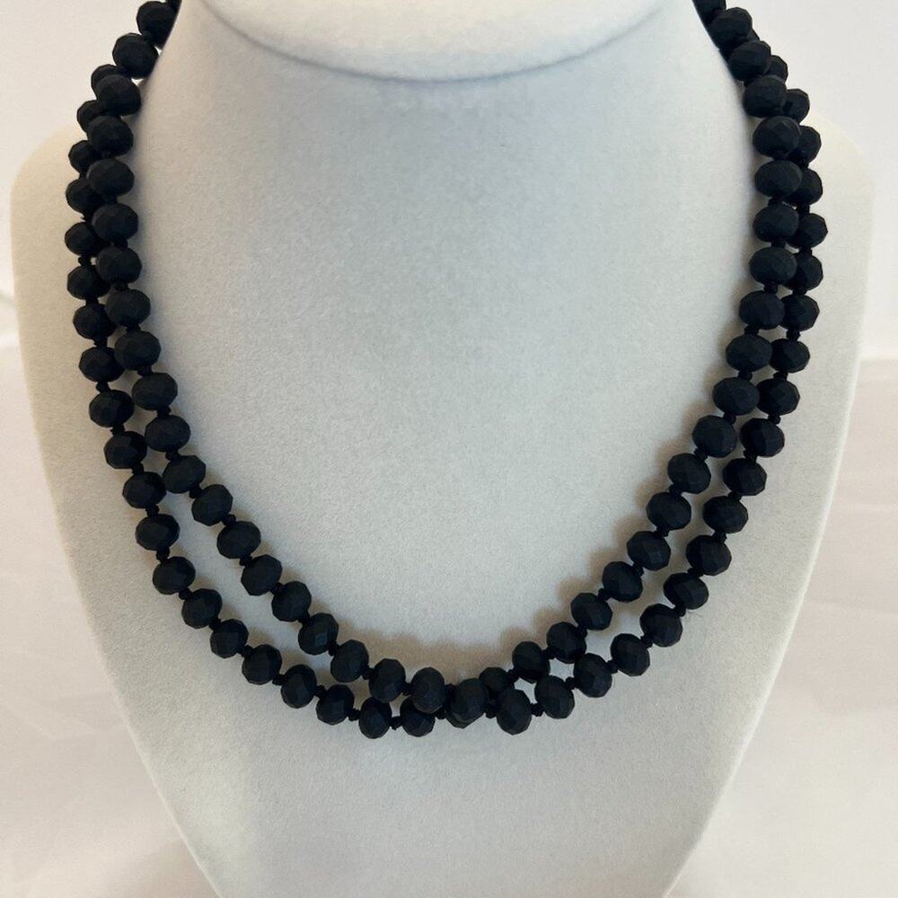 Black beaded strand necklace